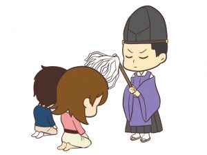厄払いのご祈祷を受ける人